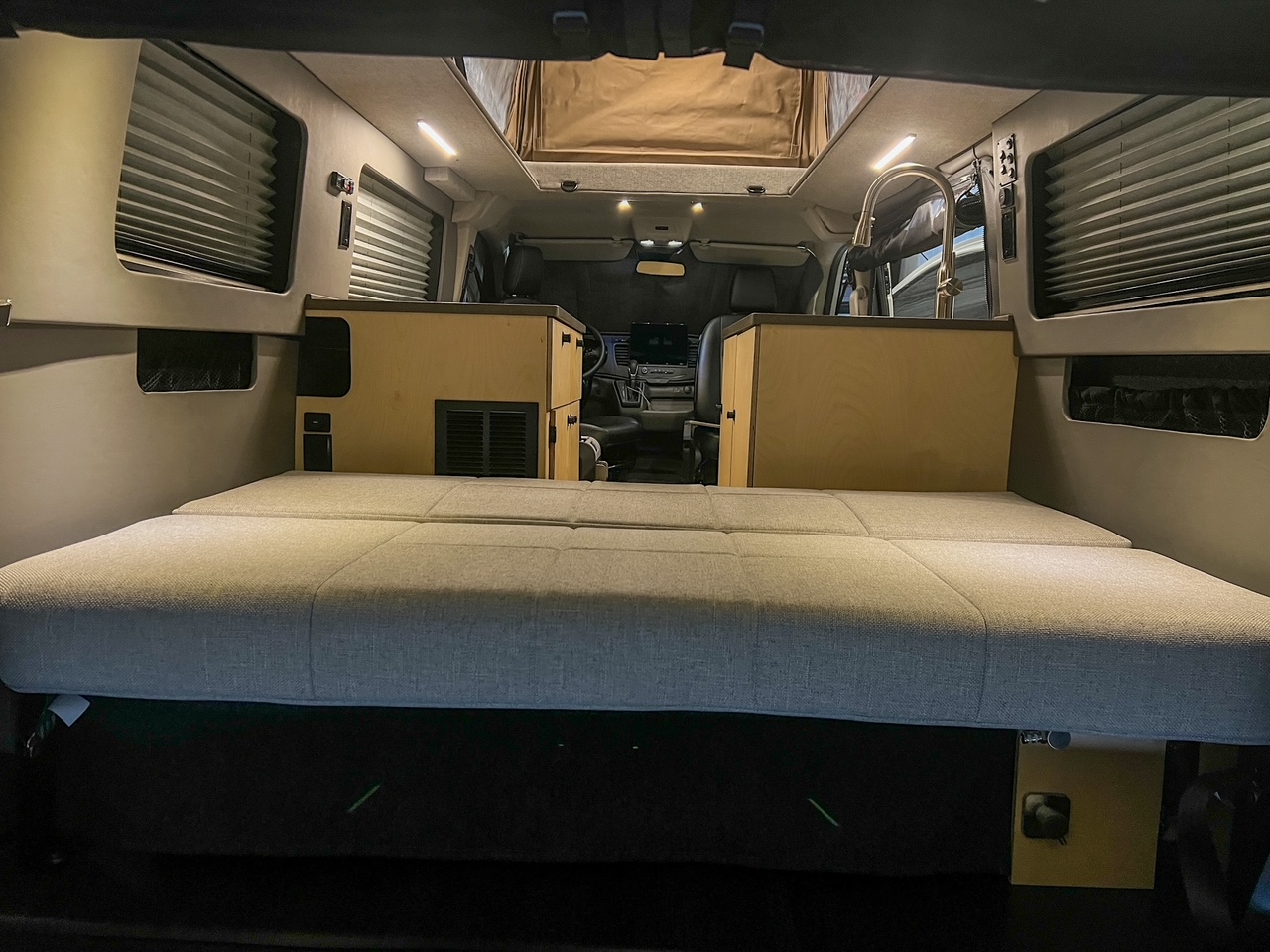 Ford Transit 130 low-roof penthouse camper van