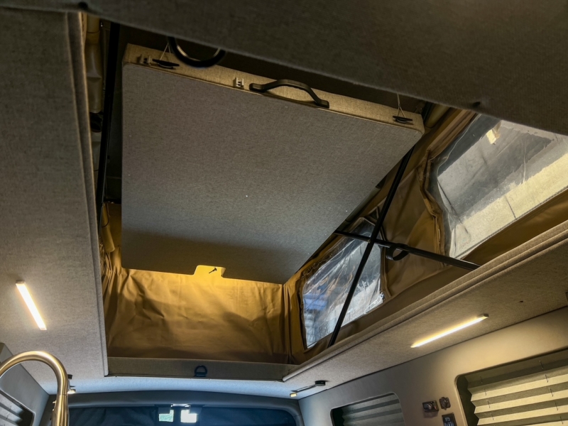 Ford Transit 130 low-roof penthouse camper van