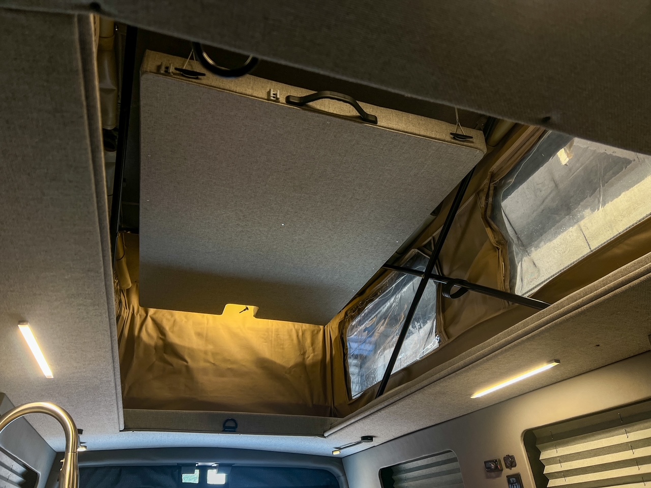 Ford Transit 130 low-roof penthouse camper van