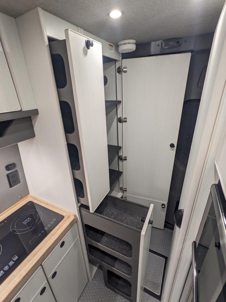 Sprinter 144 camper van cabinetry and storage detail
