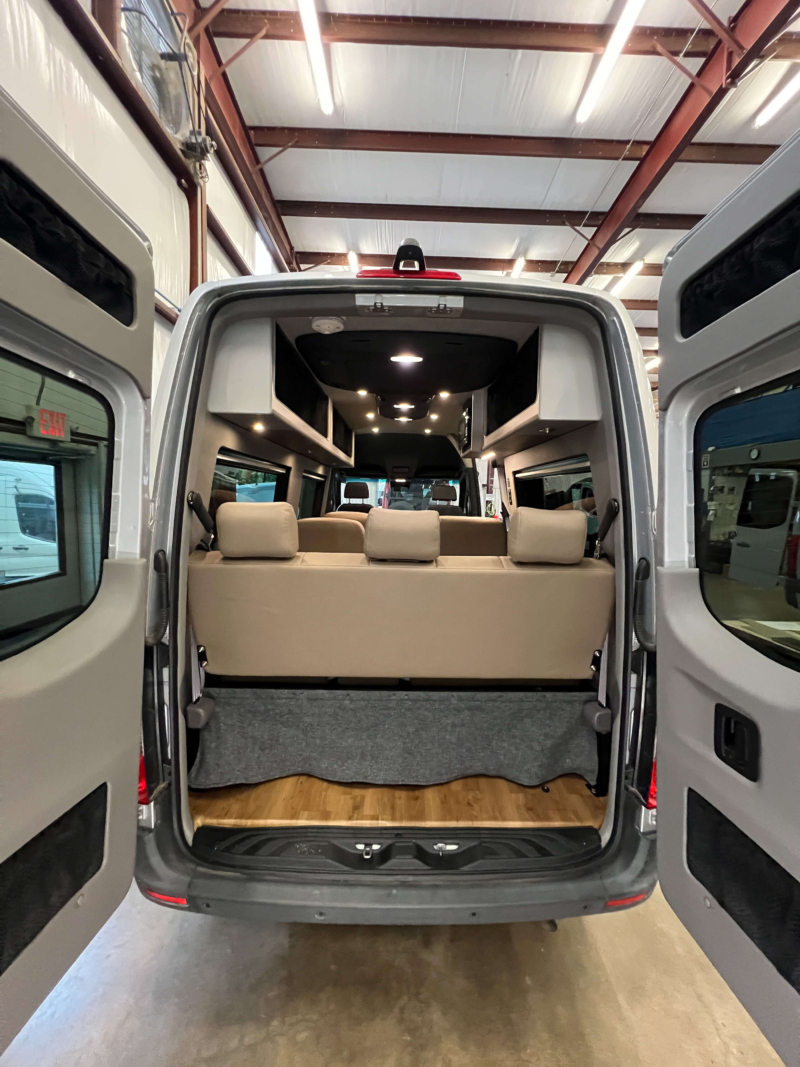 Rear view of Mercedes Sprinter showing ample storage space.