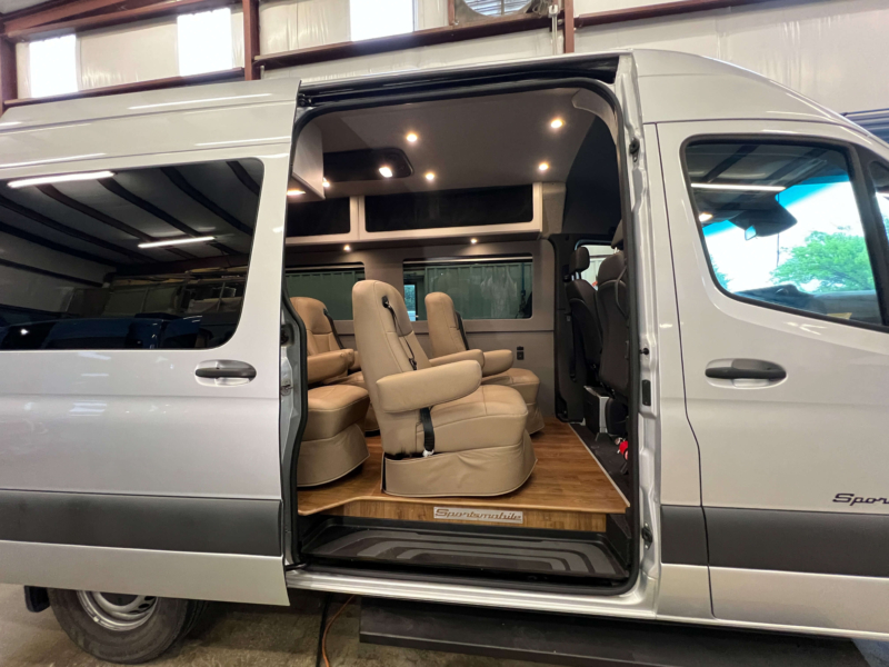 Full exterior side view of Mercedes Sprinter 144 high roof van