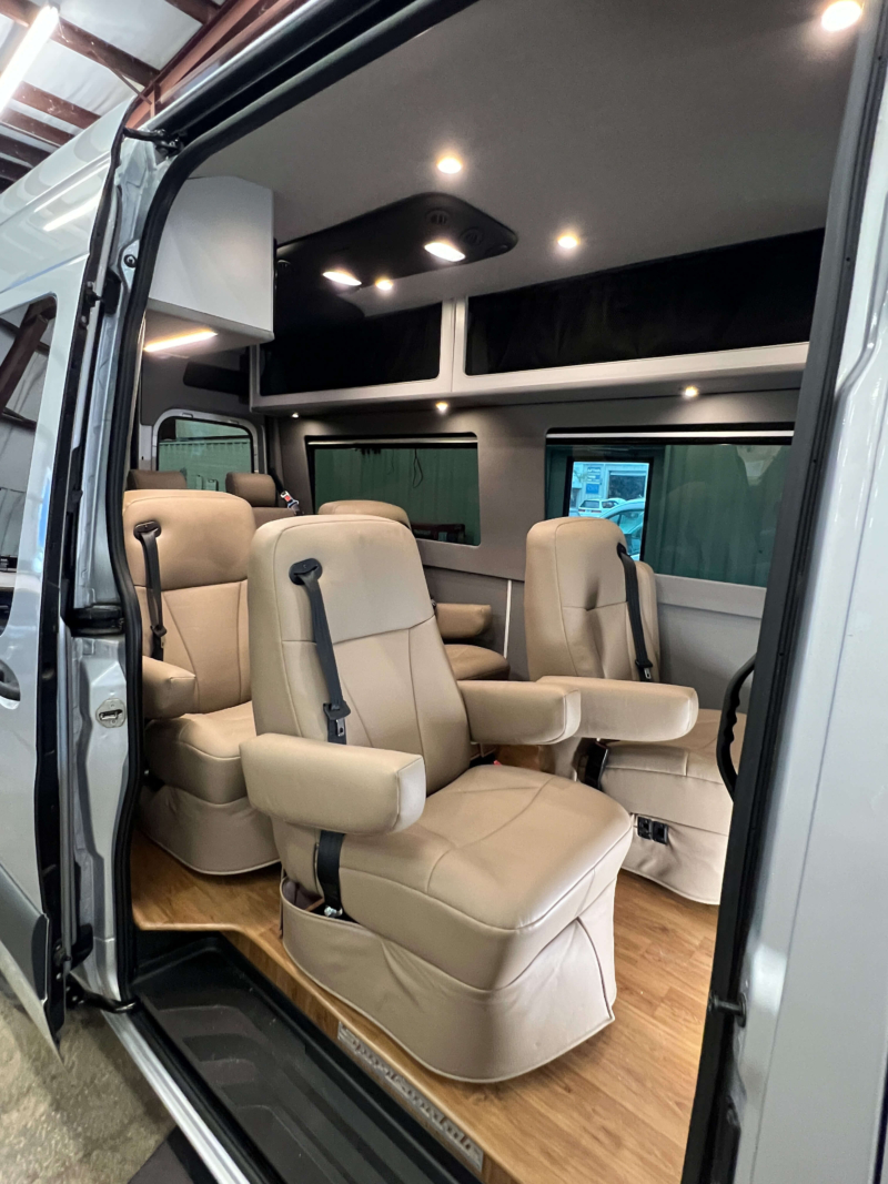 Exterior side view of open passenger door Mercedes Sprinter 144 high roof van